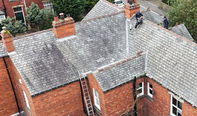red brick house with traditional roof